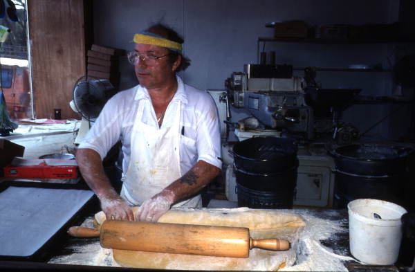 Marty Kaufmann rolling dough into knishes at Suzanne's Foods - Miami, Florida.