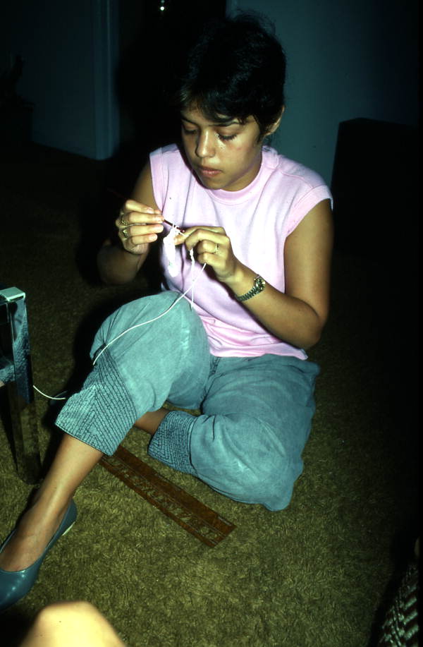 Mingly Caminero-Beheit making a hammock - Miami, Florida.