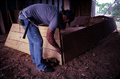 Bobby Shiver building an oyster skiff - Eastpoint, Florida