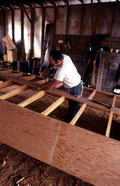 Bobby Shiver building an oyster skiff - Eastpoint, Florida