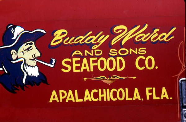 Sign on seafood transport truck - Apalachicola, Florida.