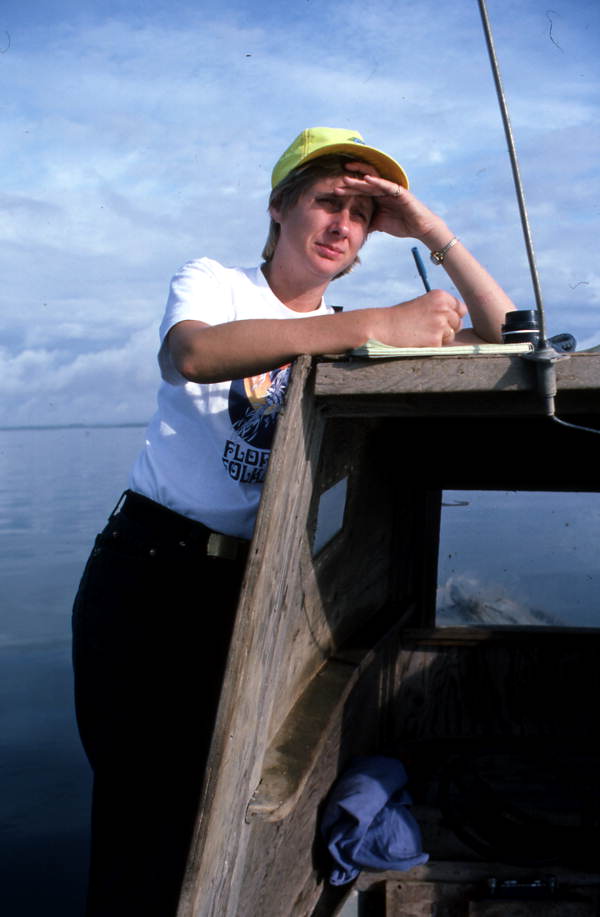 Nancy Nusz records field notes - Apalachicola Bay, Florida