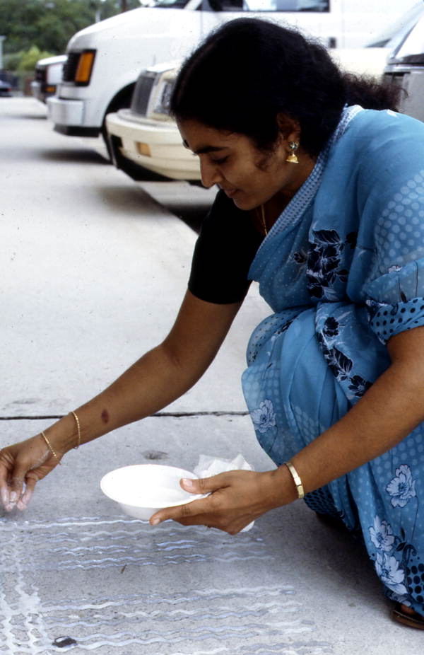 Prema Kuman making Kolam art - Jacksonville, Florida.