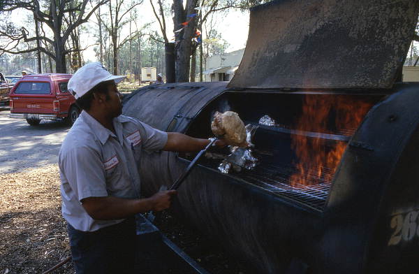 Hiram Jenkins searing ribs over the fire - Jacksonville, Florida