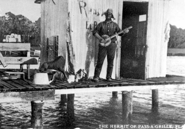 Man playing a banjo - Pass-a-Grille Beach, Florida.