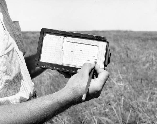 Computer card punch system used by the Game and Fish Commission .