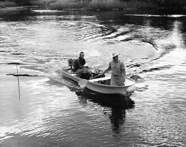 Biologists Bob Peavy and Bob Klant on a boat - Withlacoochee River, Florida.