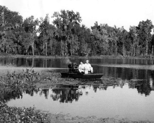 Ben Barber and Wayne Bell spraying hyacinths on Lake Harper - Columbia County, Florida.