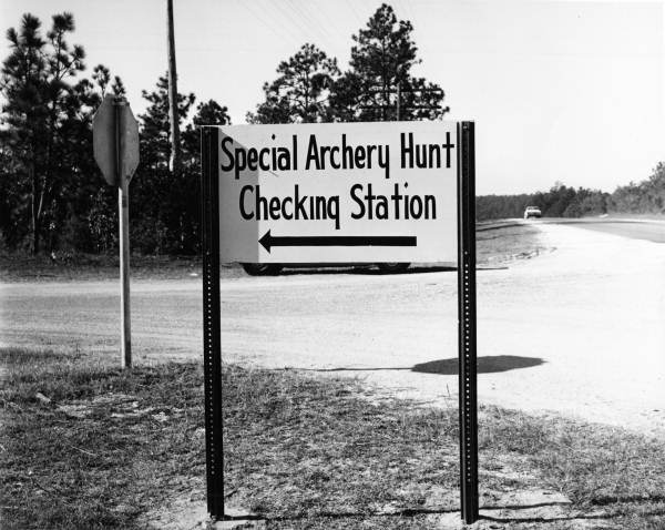 Sign to a checking station