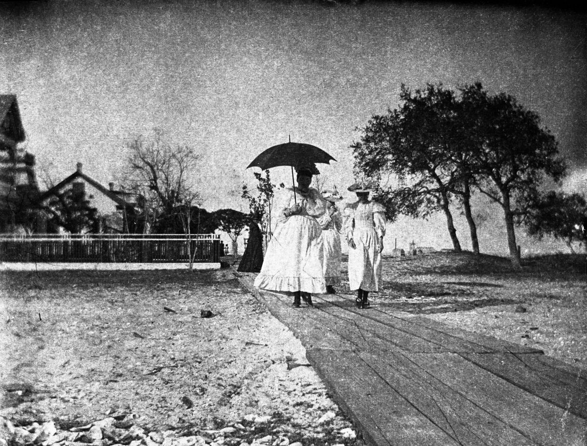 People walking on boardwalk - Apalachicola, Florida