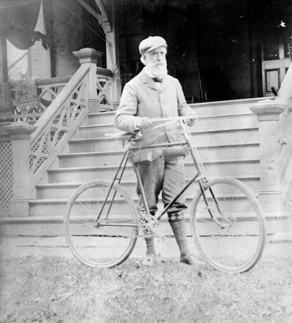 Man with bicycle - Apalachicola, Florida.