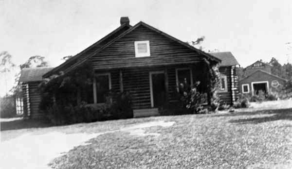 McClellan home with bottling plant in background