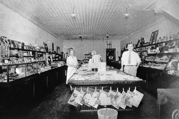 Earle and Leita Winston inside their store - Clermont