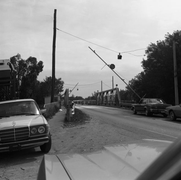 View looking south at bridge over the Tamiami Canal on S. River Dr. in Miami, Florida.