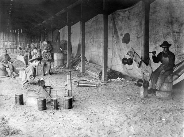 Florida National Guard Signal Corps trainees spooling wire