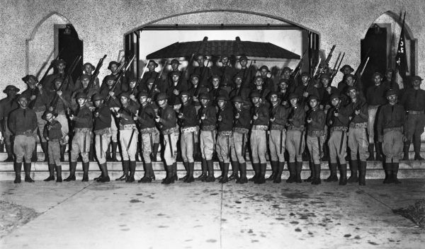 Florida National Guard unit posed with rifles