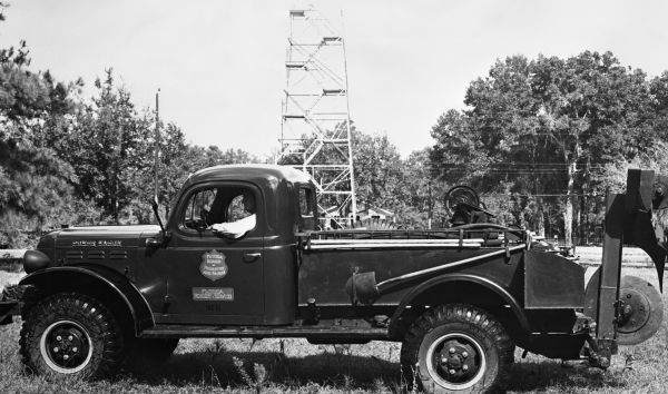 Florida Forest Service truck with drop plow on back