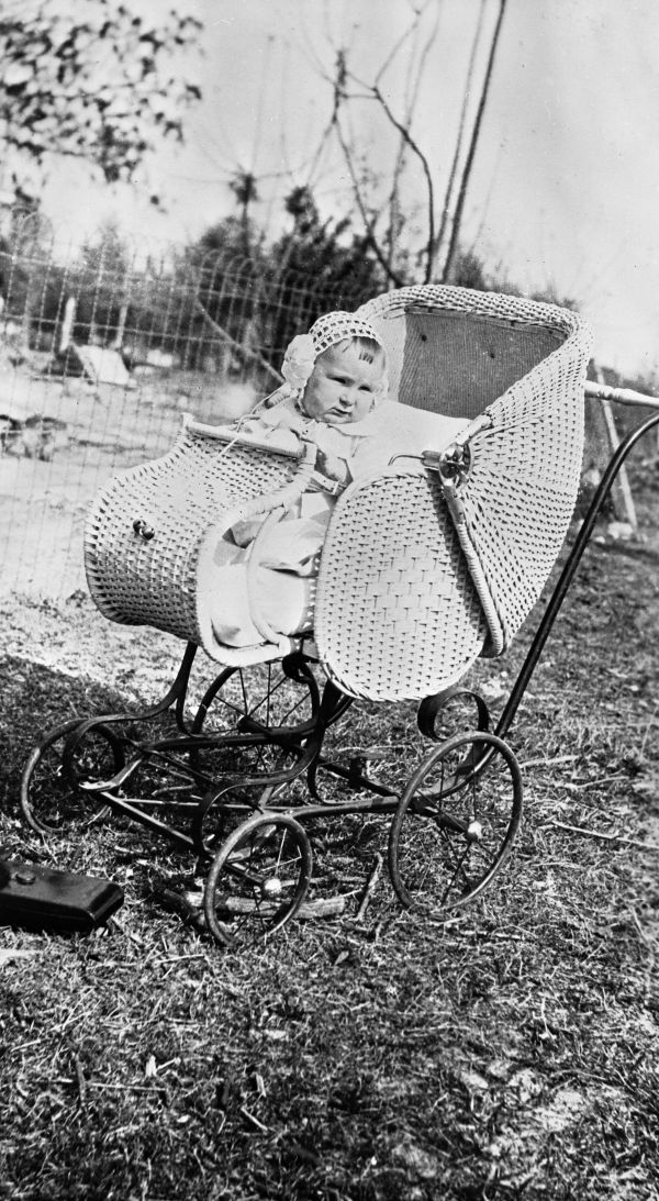 Fulton W. Boney in a baby carriage.