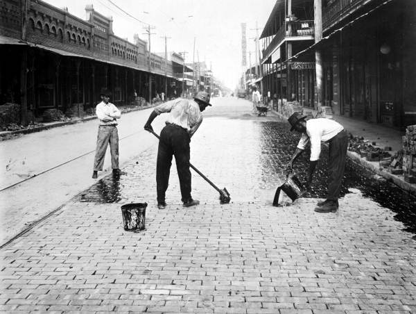 Putting down brick pavement - Tampa, Florida.