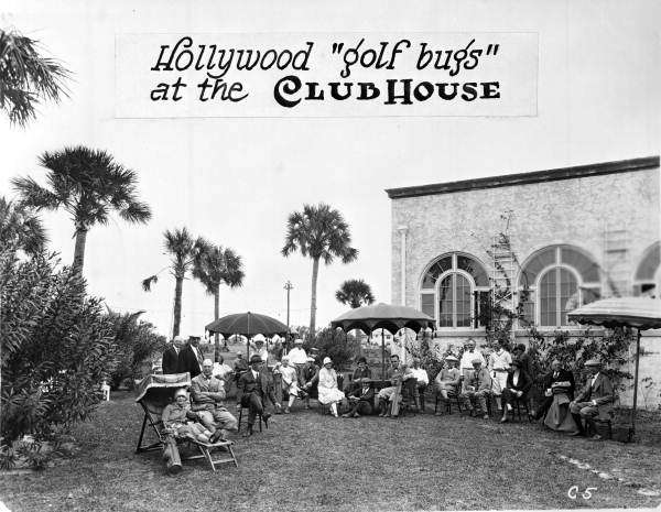 Golfers relaxing outside clubhouse - Hollywood, Florida