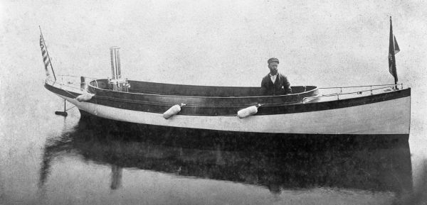 William A. Platt in dinghy from the yacht Keystone