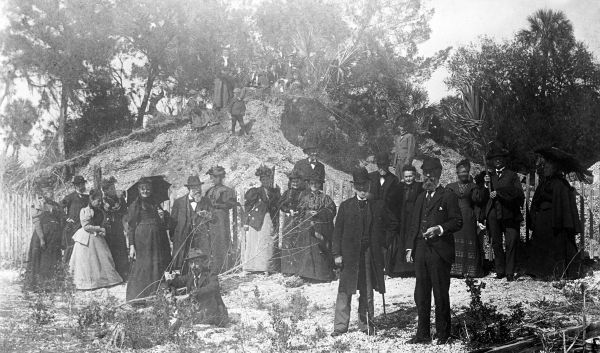 Group of people digging in shell mound - Lake Monroe, Florida