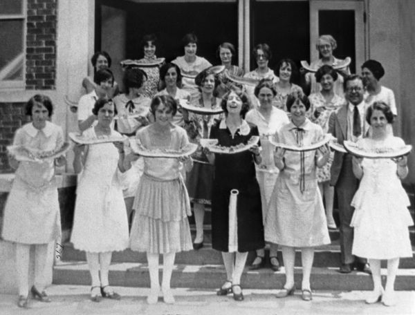 Faculty watermelon party on the front steps of Dixieland Elementary School