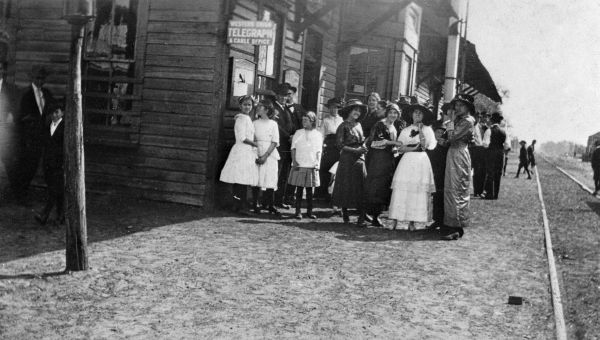 People congregating at the old railroad depot - Macclenny, Florida.