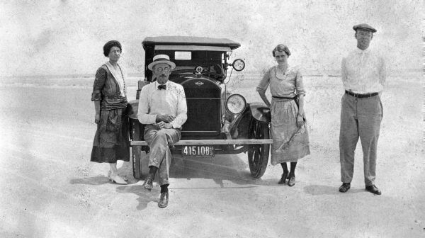 Family and car on the beach - Daytona Beach, Florida