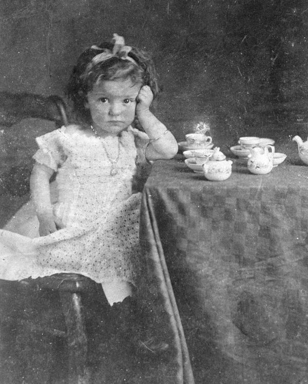 Mary Camilla Oakley with her tea set
