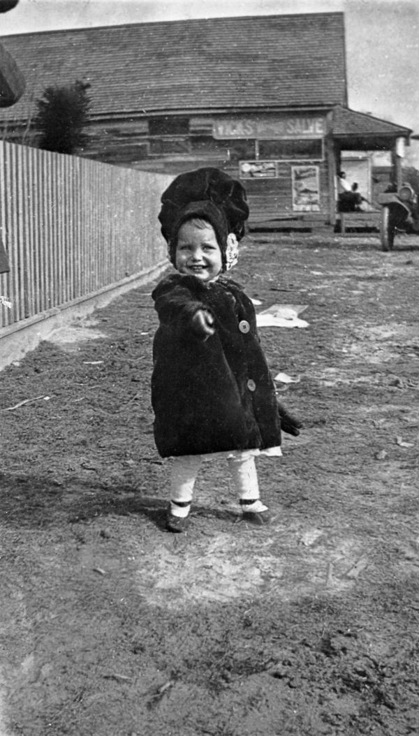 Agnes Parramore in front of Booth's store.