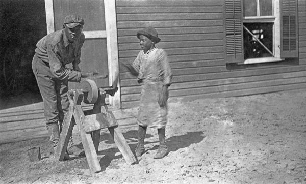 Wade Sloan "Feets" and helper sharpening tools at Tall Timbers - Tallahassee, Florida
