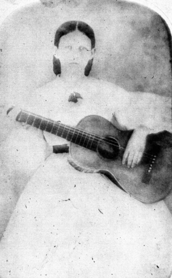 Mrs. Fannie Woodruff with guitar