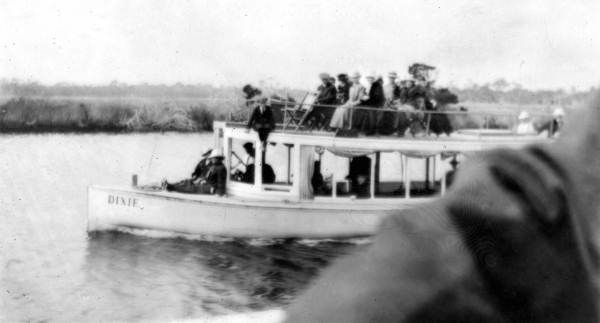 Boat loaded with tourists for a trip up the river