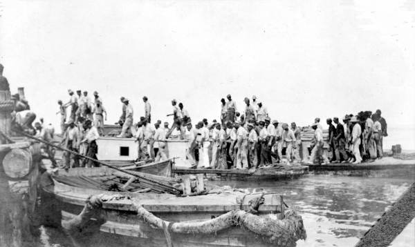 Workers arriving at the viaduct construction site - Long Key, Florida