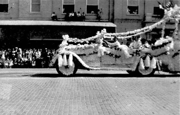 Decorated car pulling float in parade - Tallahassee, Florida.