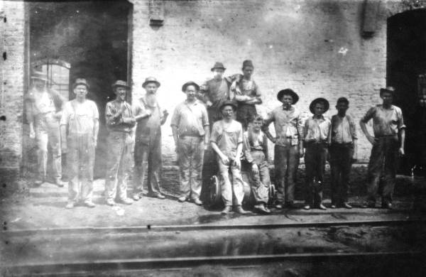 Workmen outside the freight depot - Tallahassee, Florida.