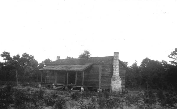 Dwelling with Marianna Limestone chimney and supports.