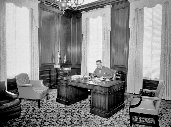Governor Millard Caldwell at his desk in the capitol