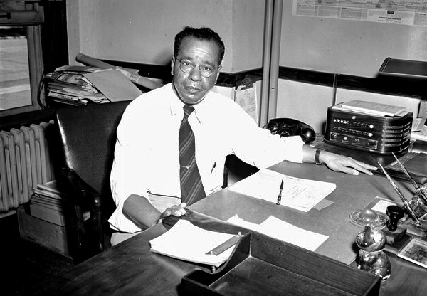 J.R.E. Lee, Jr. at his desk.