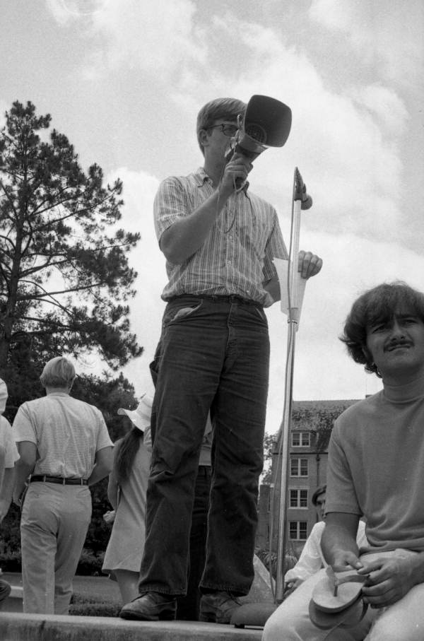 FSU student with megaphone in front of Bryan Hall - Tallahassee, Florida.