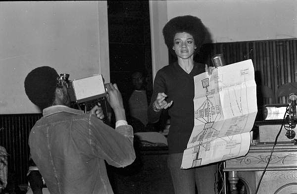 Kathleen Cleaver displaying chart during her speech at Reverend C.K. Steele's church - Tallahassee, Florida.