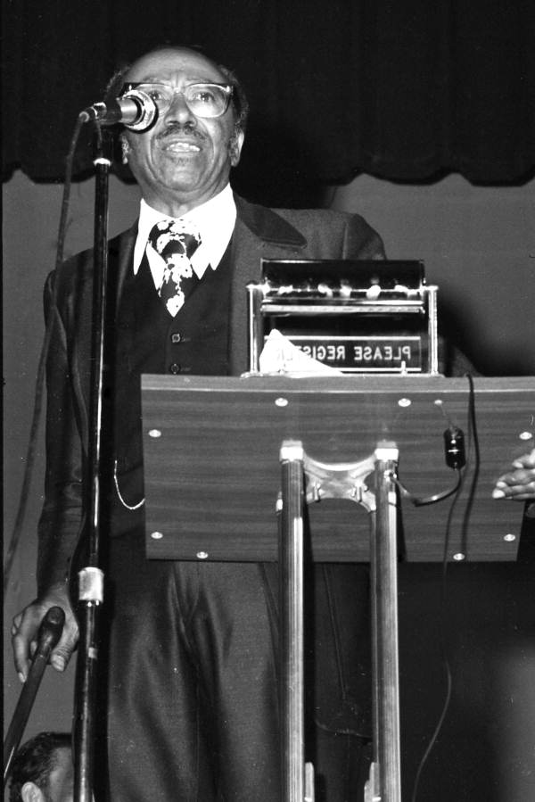 Tallahassee Civil rights leader Reverend C.K. Steele delivering a speech in an auditorium - Tallahassee, Florida.