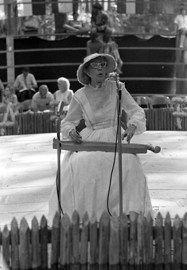 View showing an unidentified musician playing the dulcimer during a performance at the 1970 Florida Folk Festival - White Springs, Florida.
