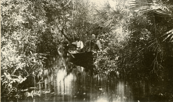 Men in a rowboat on the Indian River.