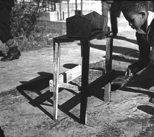 Student painting a table