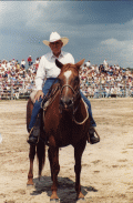 Cowboy on his horse at Cattlemen's Arena during rodeo in Okeechobee.