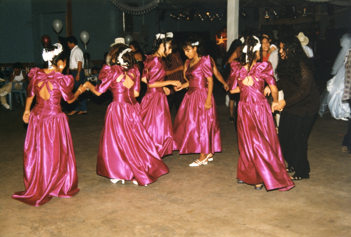 Bridesmaids dancing during wedding ceremony at the Sacred Heart Catholic Church in Okeechobee.