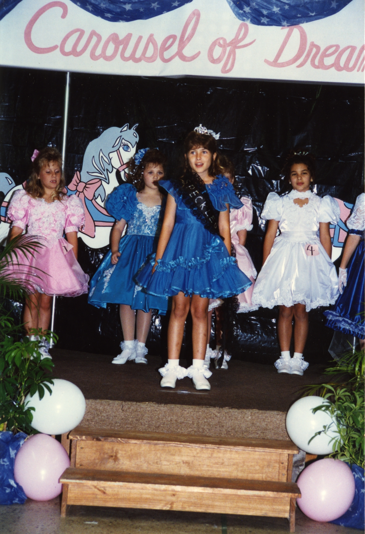 1995 Speckled Perch Princess winner on stage with 1996 contestants.