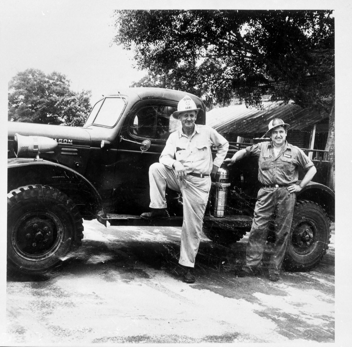 Nels Falk and Jack Woodward in front of fire truck - Pinetta, Florida